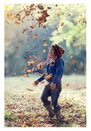 Child in leaves