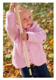 Girl sweeping leaves