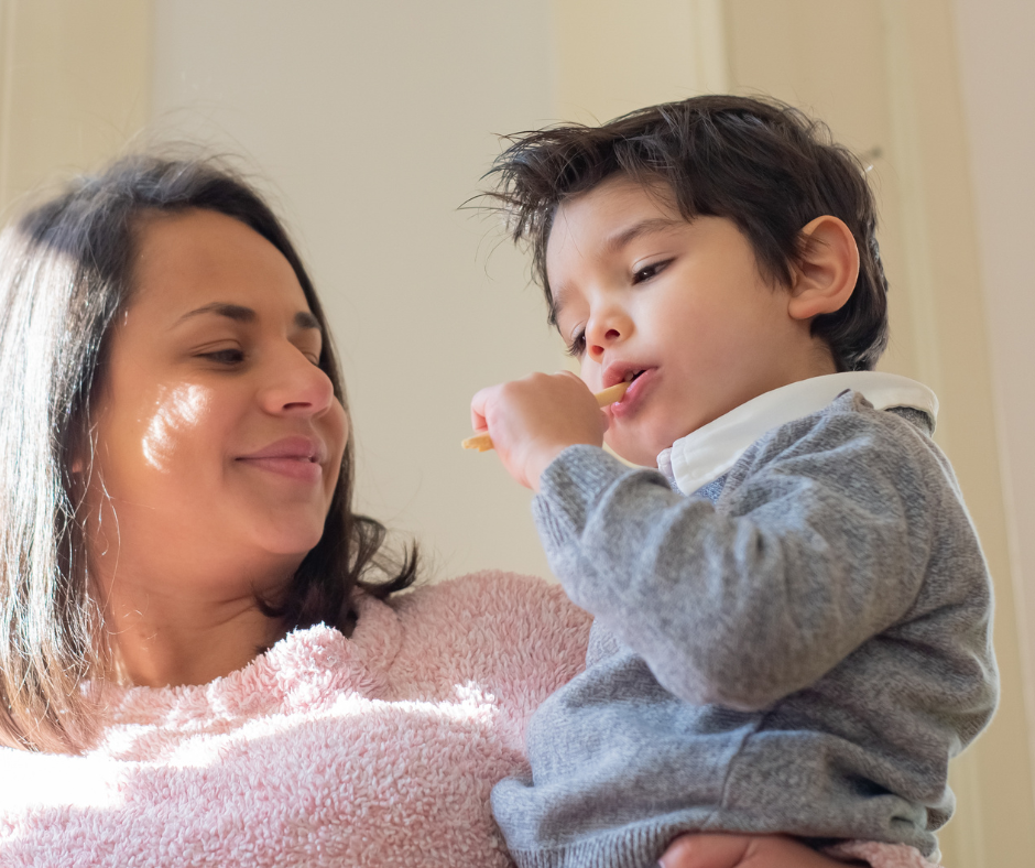 Mum holding boy